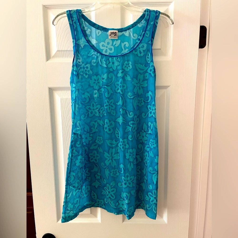 Swim suit cover up. Teal patterned nylon & spandex.